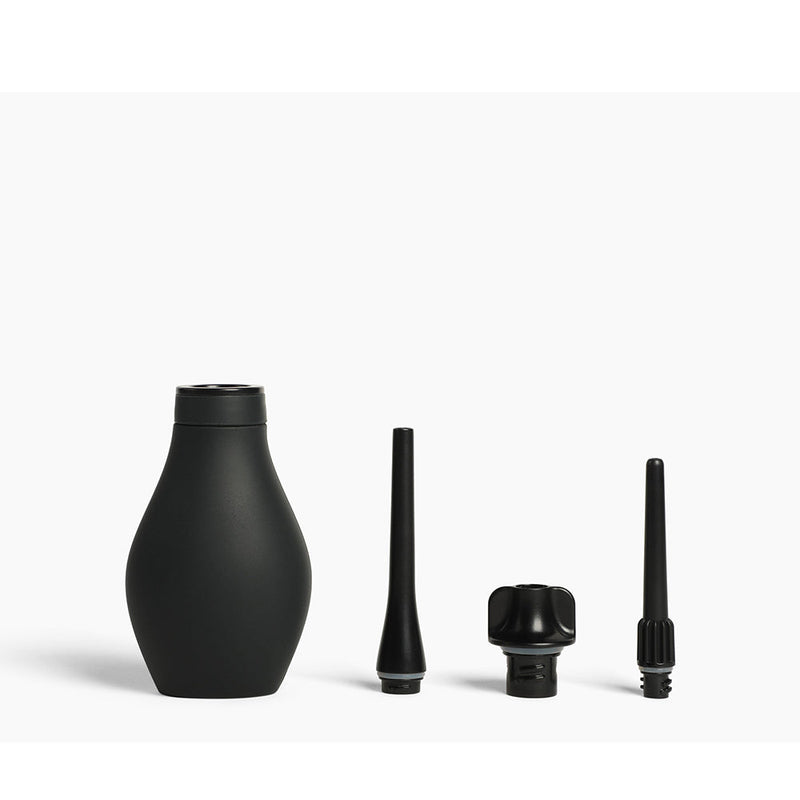 Du Douche Midnight black cleansing system components with sleek design and varying nozzles for optimal performance.