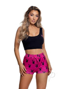 Playboy Slumber Bunny Set 2 Piece Medium Large Pink Black worn by a model featuring black tank and pink shorts with logo.