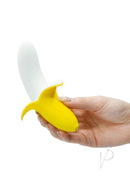 Hand holding the Banana Bliss Mini Silicone Banana Vibrator Yellow, showcasing its playful and discreet design.