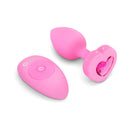 b-Vibe Vibrating Heart Anal Plug Small Medium Pink with remote control and heart-shaped jewel design.