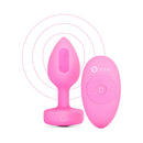 b-Vibe Vibrating Heart Anal Plug Small Medium Pink with remote control, features smooth silicone and heart-shaped design.