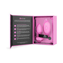 b-Vibe Vibrating Heart Anal Plug Small Medium Pink displayed in stylish packaging with remote control.