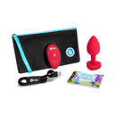b-Vibe Vibrating Heart Anal Plug Medium Large Red in a kit with remote, USB cable, pouch, and user guide