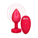 b-Vibe Vibrating Heart Anal Plug Medium Large Red with remote control for powerful vibrations.