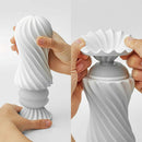 Tenga Flex Bubbly Blue Stroker in hand, showcasing its unique spiral design and flexible features for enhanced sensation.