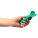Je Joue Amour Heart-Shaped Fluttering Bullet Vibrator Emerald Green in a hand for playful sensations.