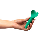 Je Joue Amour Heart-Shaped Fluttering Bullet Vibrator Emerald Green held in hand.