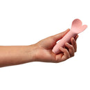 Je Joue Amour Heart-Shaped Fluttering Tip Bullet Vibrator Pale Rosette held in hand