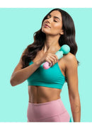 M'Lady Silicone Rechargeable Pleasure Wand Gradient held by a woman in a teal sports bra, showcasing its ergonomic design.