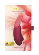 Womanizer Next Sensual Collection Air Clitoral Stimulator Red packaging featuring floral design.
