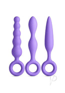 INYA Trio 3 Piece Silicone Anal Plug Kit Purple featuring three slim silicone anal plugs with finger rings for easy handling.