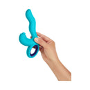 FemmeFunn Klio Triple Action Thumping Rabbit Vibrator Turquoise held in hand, showcasing its sleek design and vibrant color.