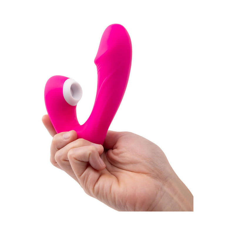 Together Internal Kiss Remote Control Vibe Pink held in hand, showcasing its dual-stimulation design.