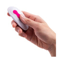 User holding Together Internal Kiss Remote Control Vibe Pink remote for enhanced pleasure and control.