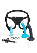 B-Vibe Strap-It-On Anal Silicone Training Kit Black/Teal with harness and beginner dildos in black and teal.