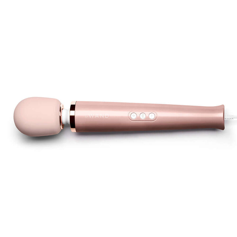 Le Wand Plug In Vibrating Massager Wand Rose Gold with extendable cord and soothing vibrations.