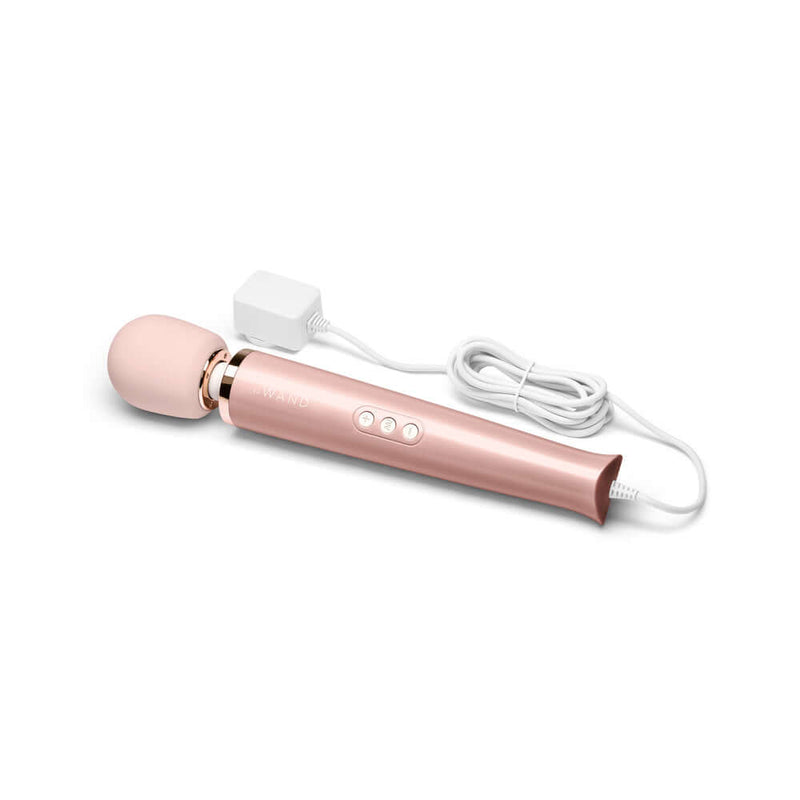 Le Wand Plug In Vibrating Massager Wand Rose Gold with long cord and soft silicone head.