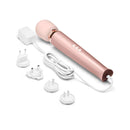 Le Wand Plug In Vibrating Massager Wand Rose Gold with accessories and charging cable.