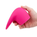 Le Wand Flick Flexible Silicone Attachment held in hand, showcasing flexible silicone design and unique shape.
