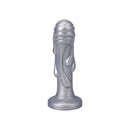 Tantus Magma 7 Inch Fantasy Dildo Medium Firm Silver with molten-metal look and drip textures.