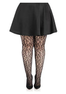 Leg Avenue Leopard Net Tights 1X 2X Black worn with a black skirt, showcasing a stylish leopard-inspired pattern.