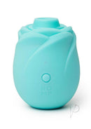 Romp Rose Glow-In-The-Dark Air Clitoral Stimulator Blue in a sleek rose design, made from soft silicone.
