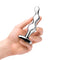 Hand holding b-Vibe Stainless Steel Anal Beads, showcasing luxurious and stimulating design for anal pleasure.