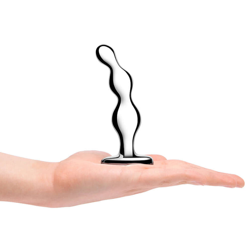 b-Vibe Stainless Steel Anal Beads held in a hand, showcasing smooth and luxurious anal pleasure.