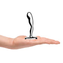 b-Vibe Stainless Steel Prostate Plug held in a hand, showcasing its sleek design and curvature for P-spot stimulation.