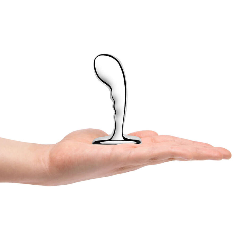 b Vibe Stainless Steel P Spot Plug Training Set on a hand showcasing its design and size