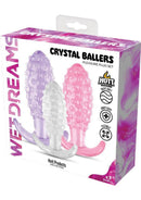 Wet Dreams Crystal Ballers 3 Piece Silicone Anal Plug Set in a colorful box showing graduated plugs.
