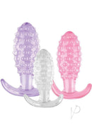Wet Dreams Crystal Ballers 3 Piece Silicone Anal Plug Set in clear, purple, and pink with textured designs.