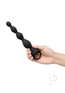 B-Vibe 6.5 Inch Silicone Vibrating Anal Beads Black held in hand showcasing its sleek design.