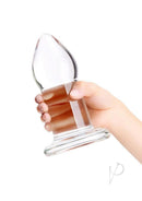 B-Vibe Advanced 7.5 Inch Glass Anal Dilator Clear held in hand for exploration of anal training.