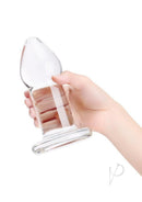 B-Vibe Intermediate Glass Anal Dilators 2 Piece Set Clear held in hand, showcasing smooth glass design.