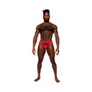 Male Power Sassy Lace Bikini Solid Pouch Red XL displayed on a model, showcasing its scalloped lace and smooth design.