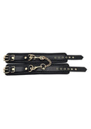 Leather Ankle Cuff With Gold Accessories featuring buckles and a chain design for a stylish look.