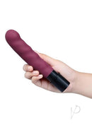 Cowgirl Thrust Rider Sex Machine Black held in hand, highlighting its sleek design and textured surface.