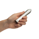 Doxy Bullet Rechargeable Vibrator Silver held in hand, showcasing its sleek design and discreet size.