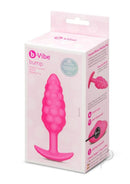 B-Vibe Bump Textured Silicone Plug Pink in packaging showcasing its unique design and features for anal play.