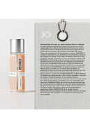 JO Bake Shoppe Lubricant Peach Cobbler 2 Oz bottle with usage instructions and ingredients displayed.
