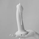 Strap-On-Me Squirting Cum Dildo Small Vanilla in hand with fluid drips, showcasing realistic finish and softness.