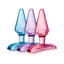 Play With Me Jolly Plug 24-piece Fishbowl Display featuring pink, purple, and blue anal plugs in a stylish arrangement.