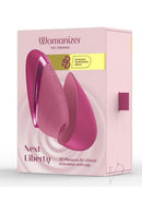 Womanizer Next Liberty Air Clitoral Stimulator Pink packaging featuring 3D Pleasure Air technology and a travel cap.