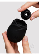 Fifty Shades of Grey Hearts & Flowers Rose 2.0 Massager being held in hands, showcasing its rose-inspired design and suction feature.