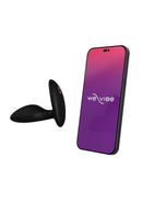 We-Vibe Ditto Plus Vibrating Butt Plug with Remote Control next to a smartphone showcasing the We-Vibe logo.