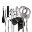 Nixie Metal Bondage 8-piece Kit Silver featuring a variety of restraint and stimulation accessories in polished silver-tone.