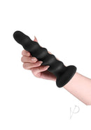 Colours Twist Silicone Dildo with Suction Cup 6.5 Inch Black held in hand, showcasing its contoured design and soft material.