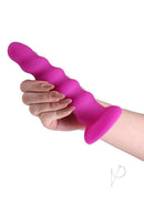 Colours Twist Silicone Dildo Suction Cup 6.5 Inch Purple held in hand showcasing its wavy design and vibrant color.