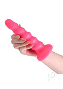 Colours Twist Silicone Dildo with Suction Cup 6.5 Inch Pink held in hand, showcasing its textured design and strong suction base.